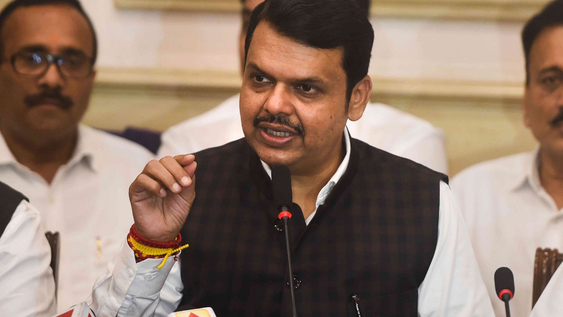 Devendra Fadnavis, former Chief Minister of Maharashtra, speaking at a press conference, offering to resign and taking responsibility for BJP's electoral performance.